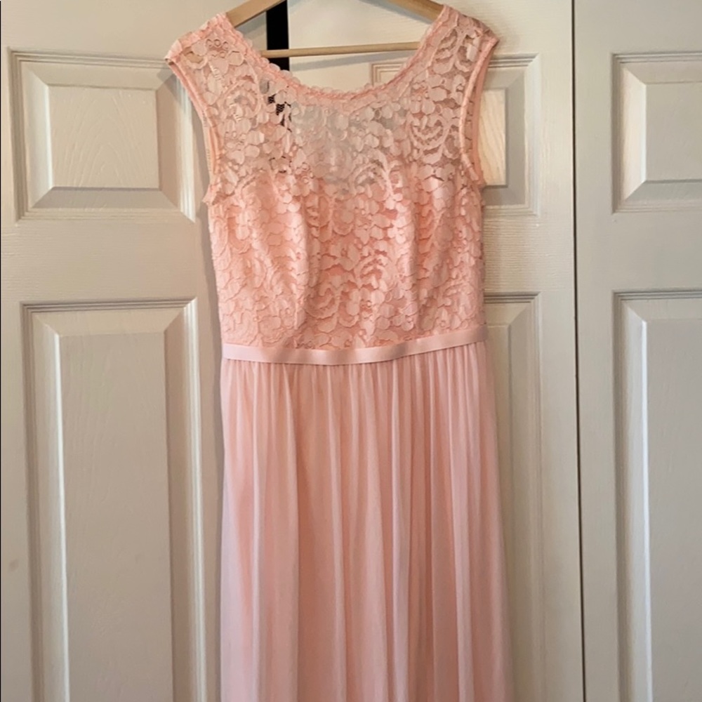 Light pink bridesmaid dress.
